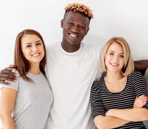 Young adults hanging out and smiling